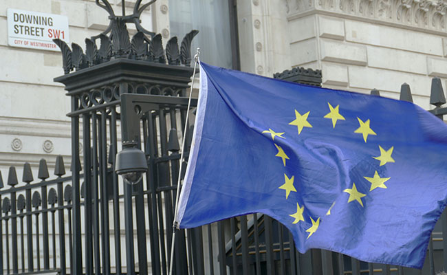Downing Street sign and EU flag